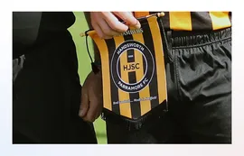 Official team pennants for exchange between captains